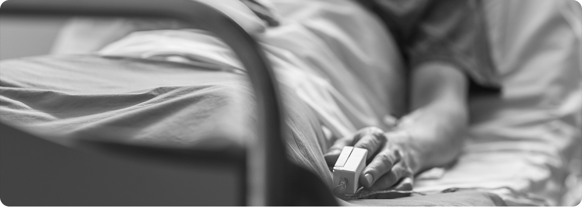 Man in hospital bed